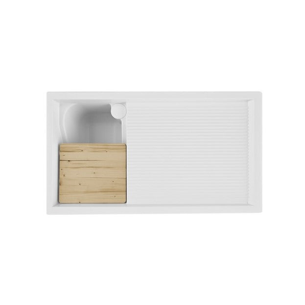 Mueble de madera con fregadero y tapa para lavadora.