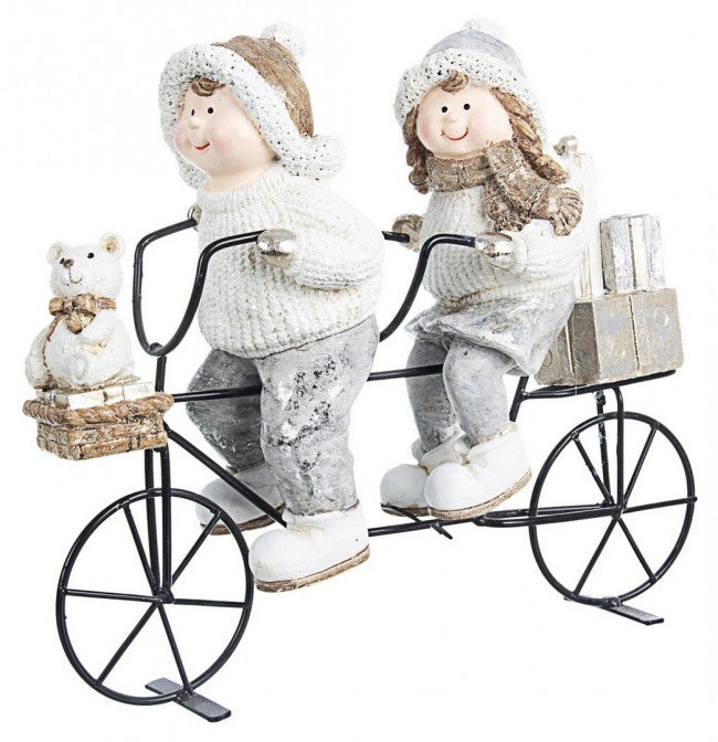 2x niños motociclistas dorados