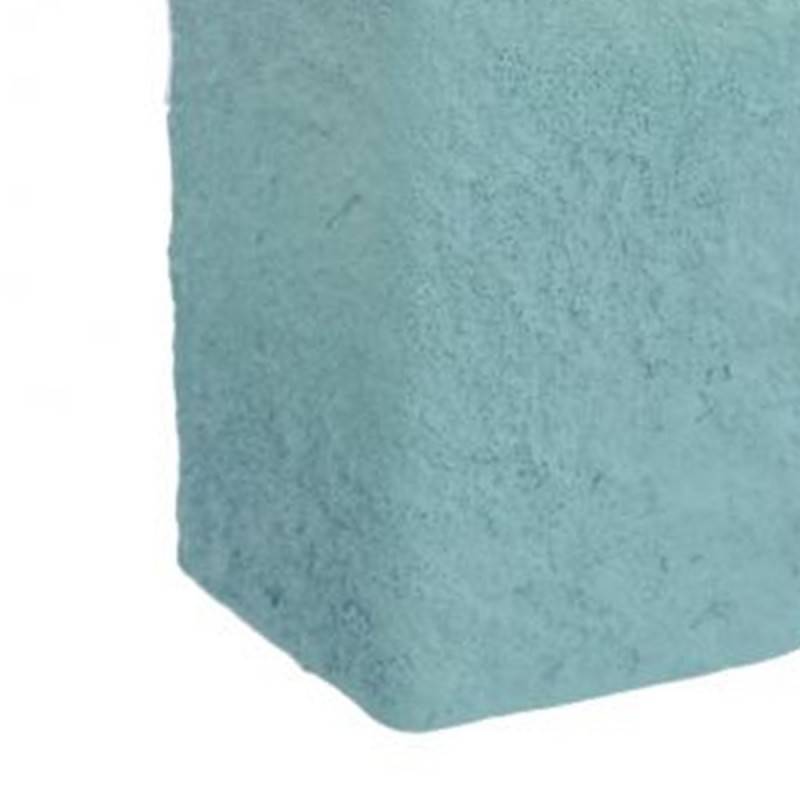 Portacepillos de dientes con diseño inspirado en la serie Sabbia, en un fresco color aguamarina.