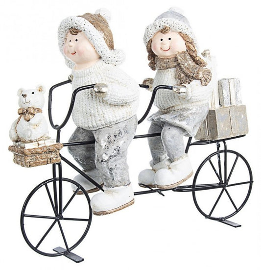 2x niños motociclistas dorados