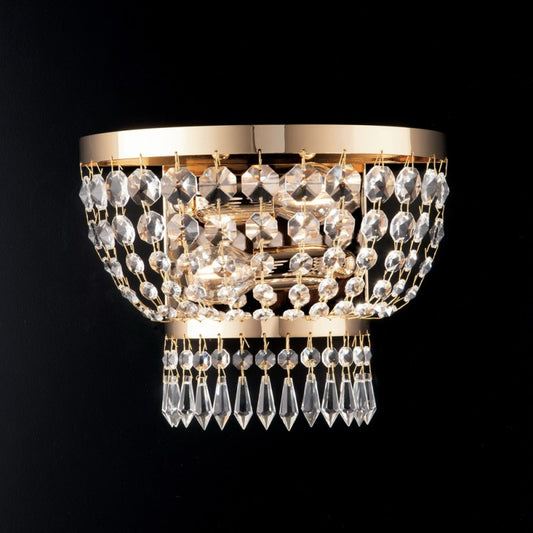 Aplique imperial de hierro dorado y latón con dos luces 27x h22 cm