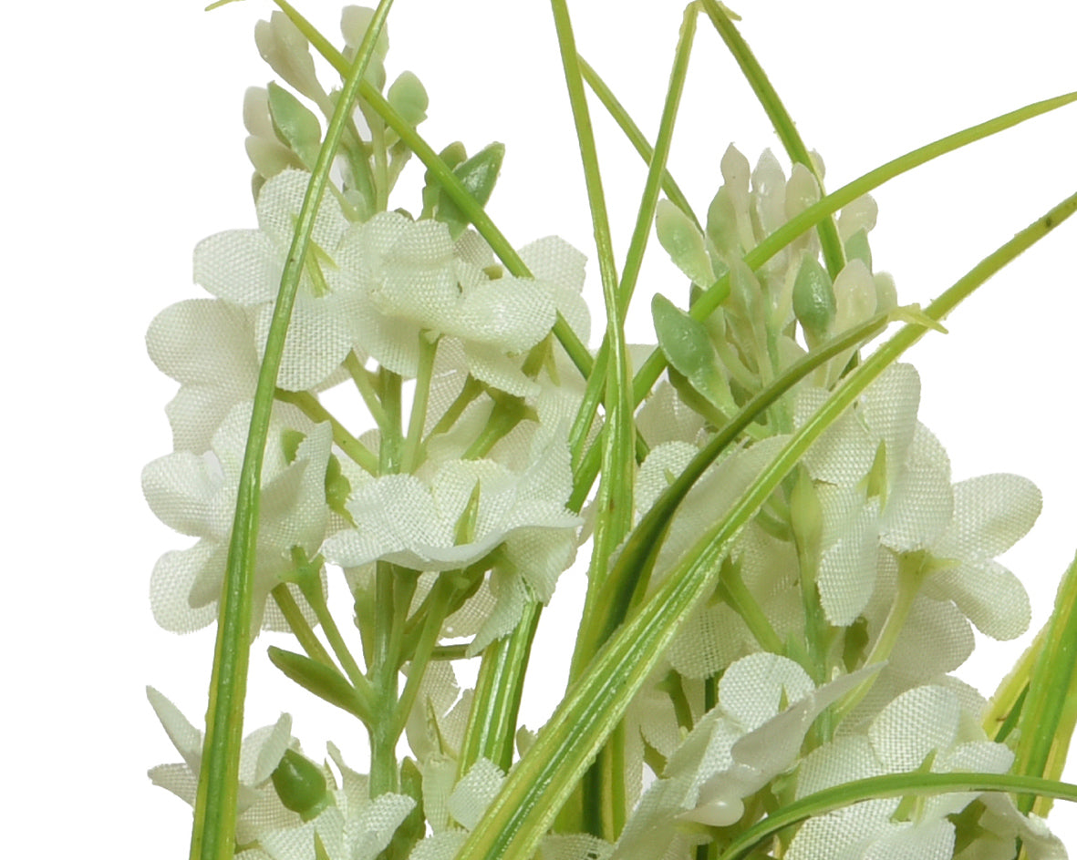 Flores artificiales de poliéster surtidas con cinta.