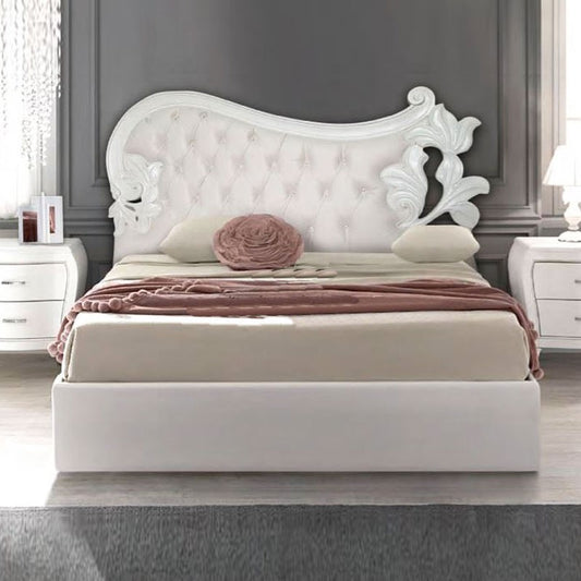 Cama doble en madera tallada con cabecero acolchado de ecopiel 185x204xh.160 cm