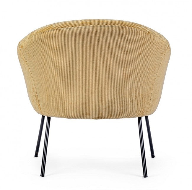 Sillón de terciopelo amarillo con estilo de diseño.